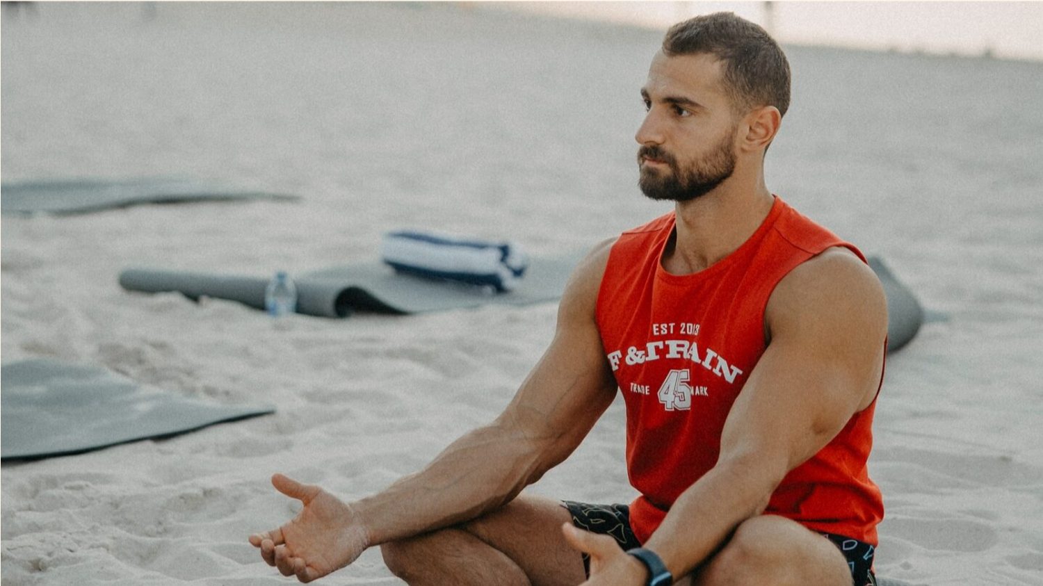 Basel Tayyan on the beach, coaching a mindful, healthy lifestyle